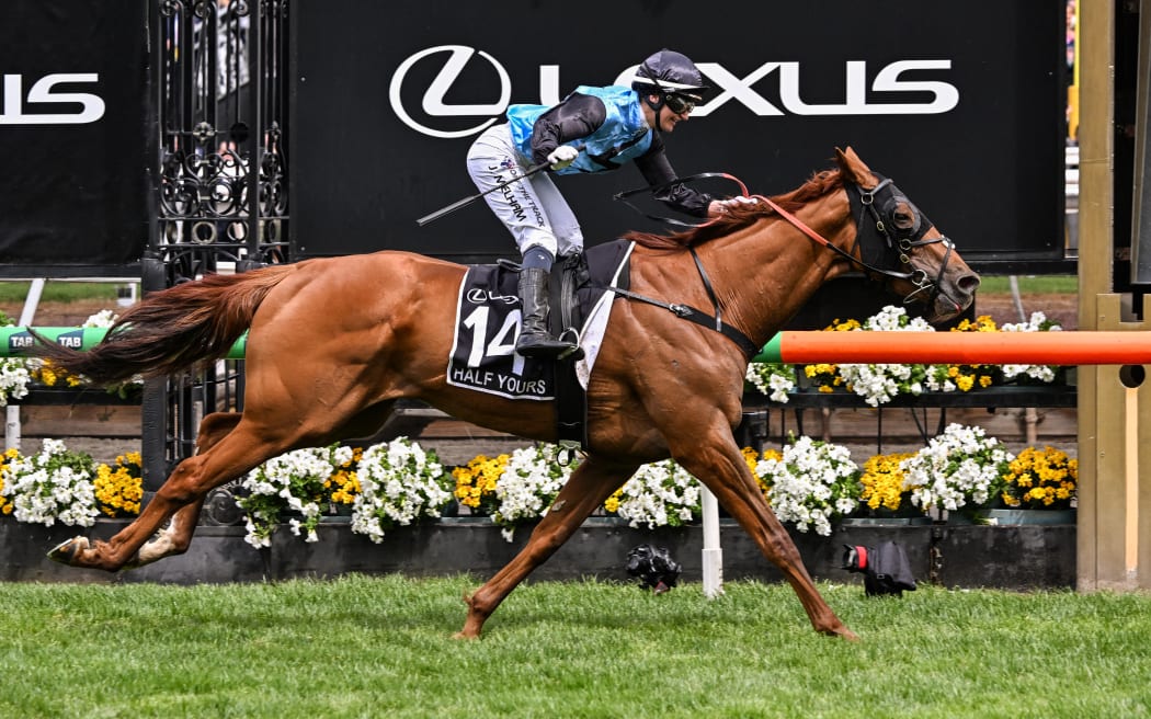 Half Yours ridden by Australian jockey Jamie Melham wins the Melbourne Cup horse race at the Flemington Racecourse in Melbourne on November 4, 2025. (Photo by WILLIAM WEST / AFP)