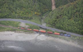A Kiwirail train is seen on the Kaikoura Coast after yesterday's earthquake.