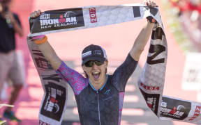Jocelyn McCauley cross the finish line.