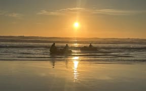 Surf Life Saving's James Lea said they had been trialling an evening patrol at Bethells Beach this year and they were able to go to O'Neills Bay to help with the rescue.