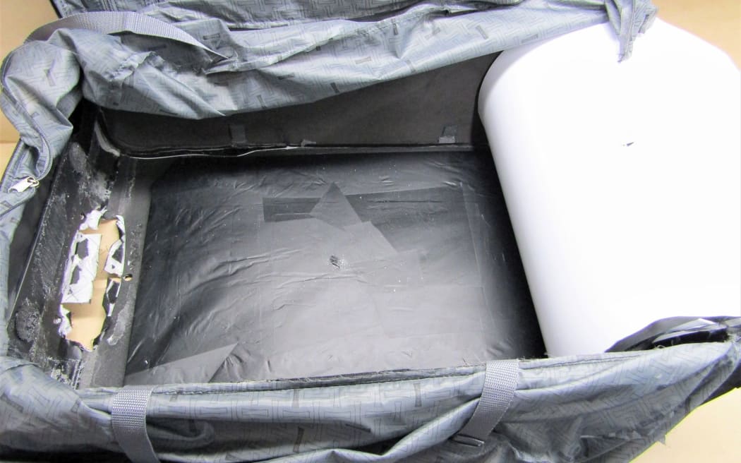 The suitcase lining that hid three kilograms of cocaine.