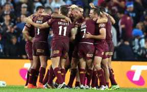 Queensland players celebrate winning State of Origin game one 2016.