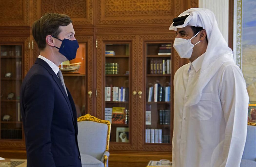 Senior advisor to US President Jared Kushner (left) meeting with Qatar's ruler Emir Sheikh Tamim bin Hamad al-Thani in the capital Doha as shown in a picture released on December 2, 2020.