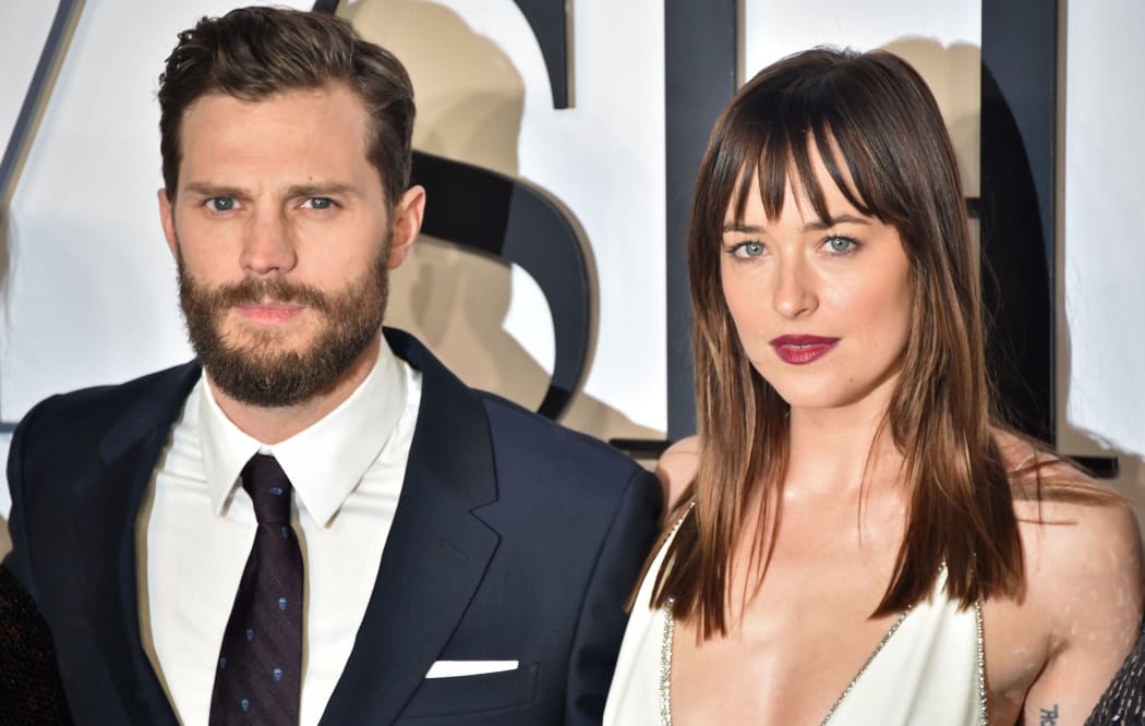 Jamie Dornan, left, and Dakota Johnson at the the UK Premiere of Fifty Shades of Grey. 12 February, 2015.