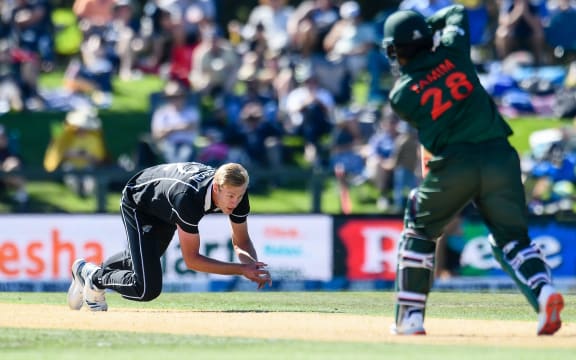 Kyle Jamieson of the Black Caps fields the ball off Tamim Iqbal of Bangladesh 2021.