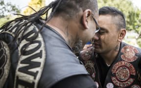 Gang members greet at the hui in Wainuiomata over the weekend.