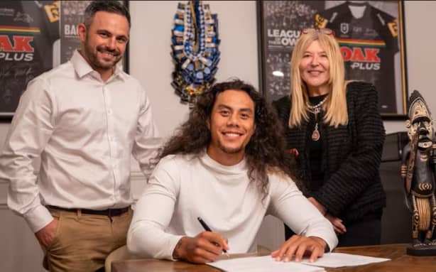 Jarome Luai signs as the PNG Chiefs marquee player. (Supplied: PNG Chiefs)