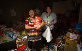 Volunteers sorting food at Te Puea Marae