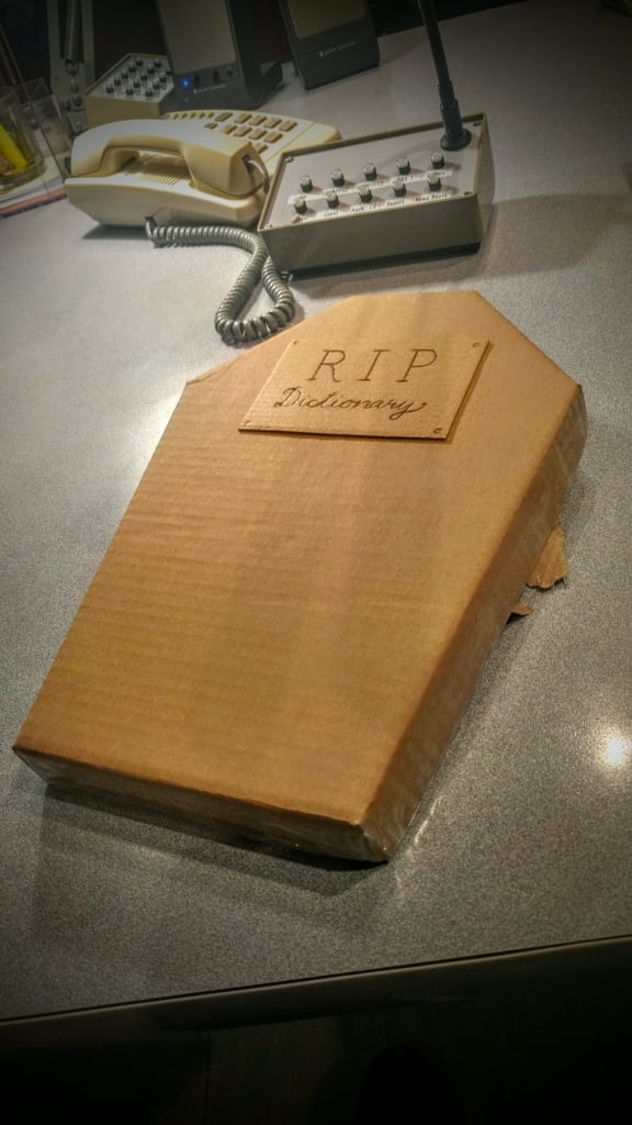 A dictionary in a home made cardboard coffin