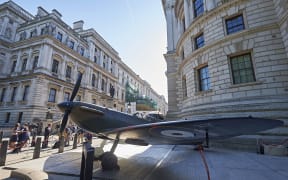 A Spitfire Mk.1A outside the Churchill War Rooms in London before its auction.