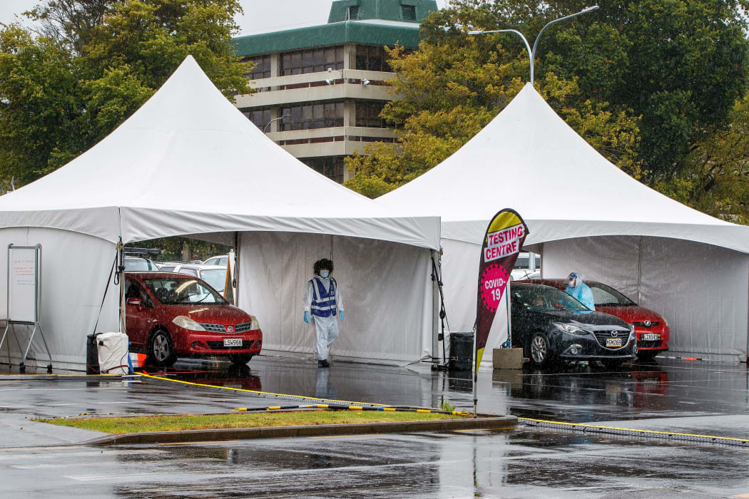 Motorists queue at the Otara testing station after a positive COVID-19 coronavirus case was reported in the community as the city enters a level 3 lockdown in Auckland on February 15, 2021.