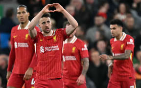 Liverpool's Portuguese striker Diogo Jota celebrates scoring the only goal in their Premier League match against Everton at Anfield, 3 April, 2025.