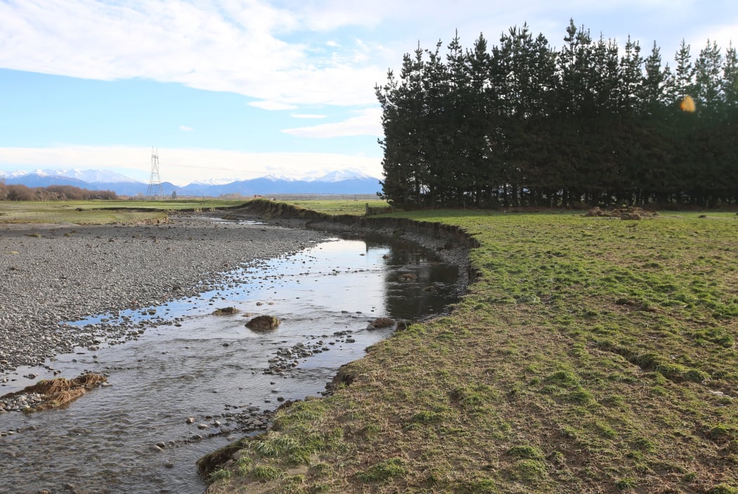 the Ashburton River is virtually running through the back of the Stewarts' family farm after May 2021 flooding