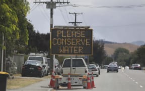 Road signs all around the area reminding people to conserve water.