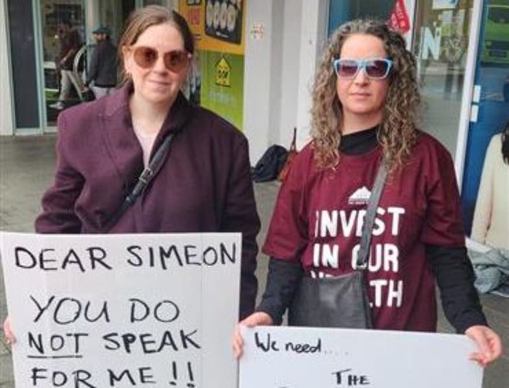 Cancer patient Charyl Robinson (left) and one of her "amazing team of -ologists", medical oncologist Sharon Pattison joined the picket in Johnsonville today.