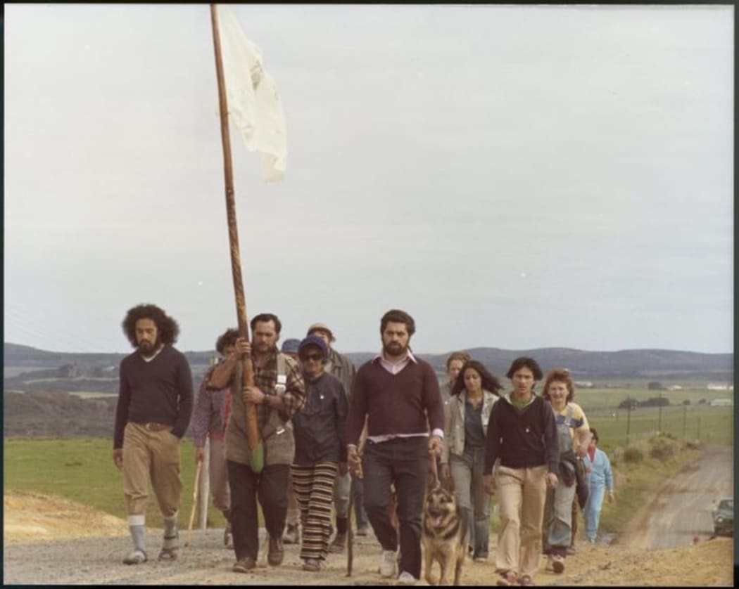 Group of Maori Land March demonstrators photographed on a rural road between Te Hapua and Mangamuka by Christian F Heinegg, 13-17 September 1975.