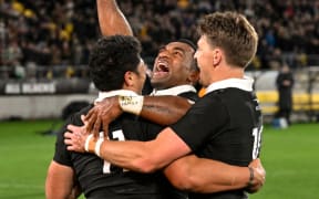 Caleb Clarke of New Zealand celebrates his try with Sevu Reece of New Zealand and /Beauden Barrett of New Zealand.
New Zealand All Blacks v Australia Wallabies, Bledisloe Cup and Rugby Championship rugby union test match at Sky Stadium, Wellington, New Zealand on Saturday 28 September 2024. © Photo: Harry Cornaga / Photosport