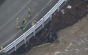 Thunderstorms and torrential rain battered communities along Victoria's Great Ocean Road and swept vehicles into the sea.