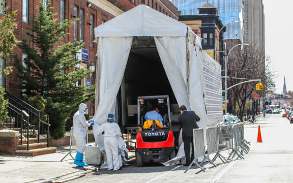 A refrigerated truck is used as a morgue at The Brooklyn Hospital Center in the Brooklyn neighborhood of New York during the Covid-19 pandemic in the United States in April, 2020.