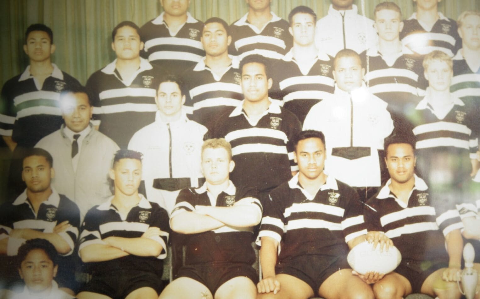 Jonah Lomu centre in a old school team shot.