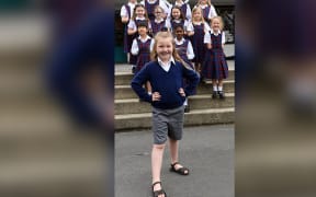 Kayleigh Dryden sports shorts at Francis Xavier Catholic School after petitioning for girls to be able to wear them.