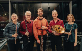 The wind quintet from the Auckland Chamber Orchestra ... posed shot with their instruments