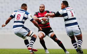 Patrick Osborne of Canterbury meets Ofa Tu'ungafasi and Joe Edwards of Auckland.