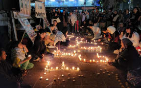 Hundreds attended a candlelit vigil in Aotea Square on Wednesday 18 October in support of Gaza. Protestors chanted, 'Free Palestine', lit candles and waved Palestinian flags.