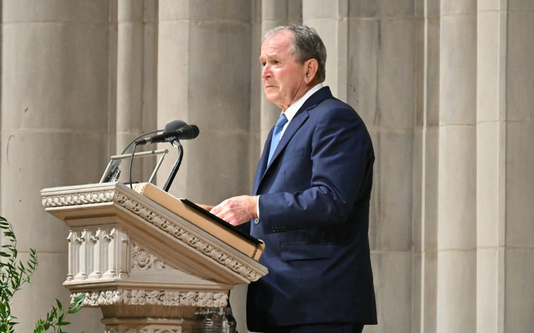 Former US President George W. Bush speaks during the funeral service for late US Vice President Dick Cheney at the Washington National Cathedral in Washington, DC, on November 20, 2025. Dick Cheney, celebrated as a master Republican strategist but defined by the darkest chapters of America's "War on Terror," was honored Thursday in a funeral attended by Washington's elite that pointedly left out President Donald Trump. (Photo by SAUL LOEB / AFP)