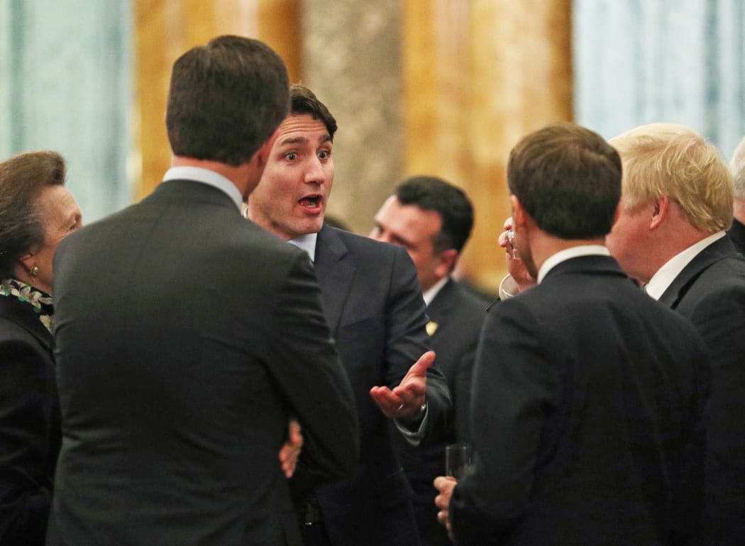 Britain's Princess Anne, talks to Canadian Prime Minister Justin Trudeau, (3L) and Britain's Prime Minister Boris Johnson (R), France's President Emmanuel Macron (2R - back to camera) and NATO Secretary General Jens Stoltenberg .