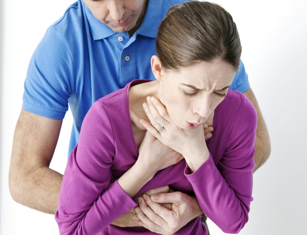 First aid manuals recommend performing a maximum of 5 abdominal thrusts, also known as the Heimlich manoeuvre, to dislodge the article from the airway.