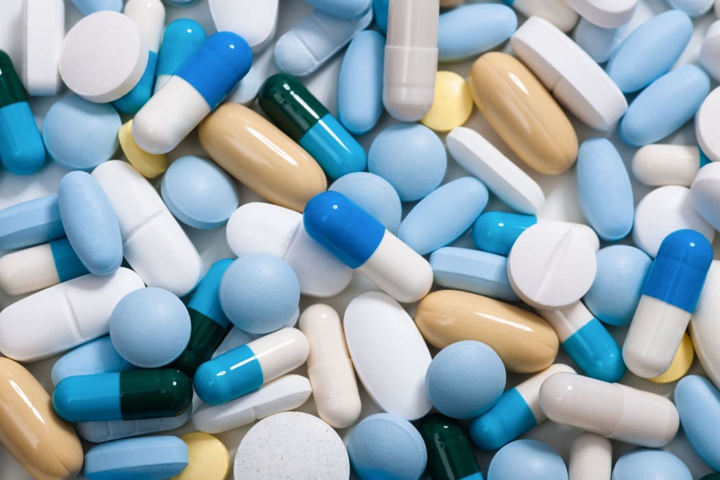 Heap of medicine pills.  Background made from colorful pills and capsules