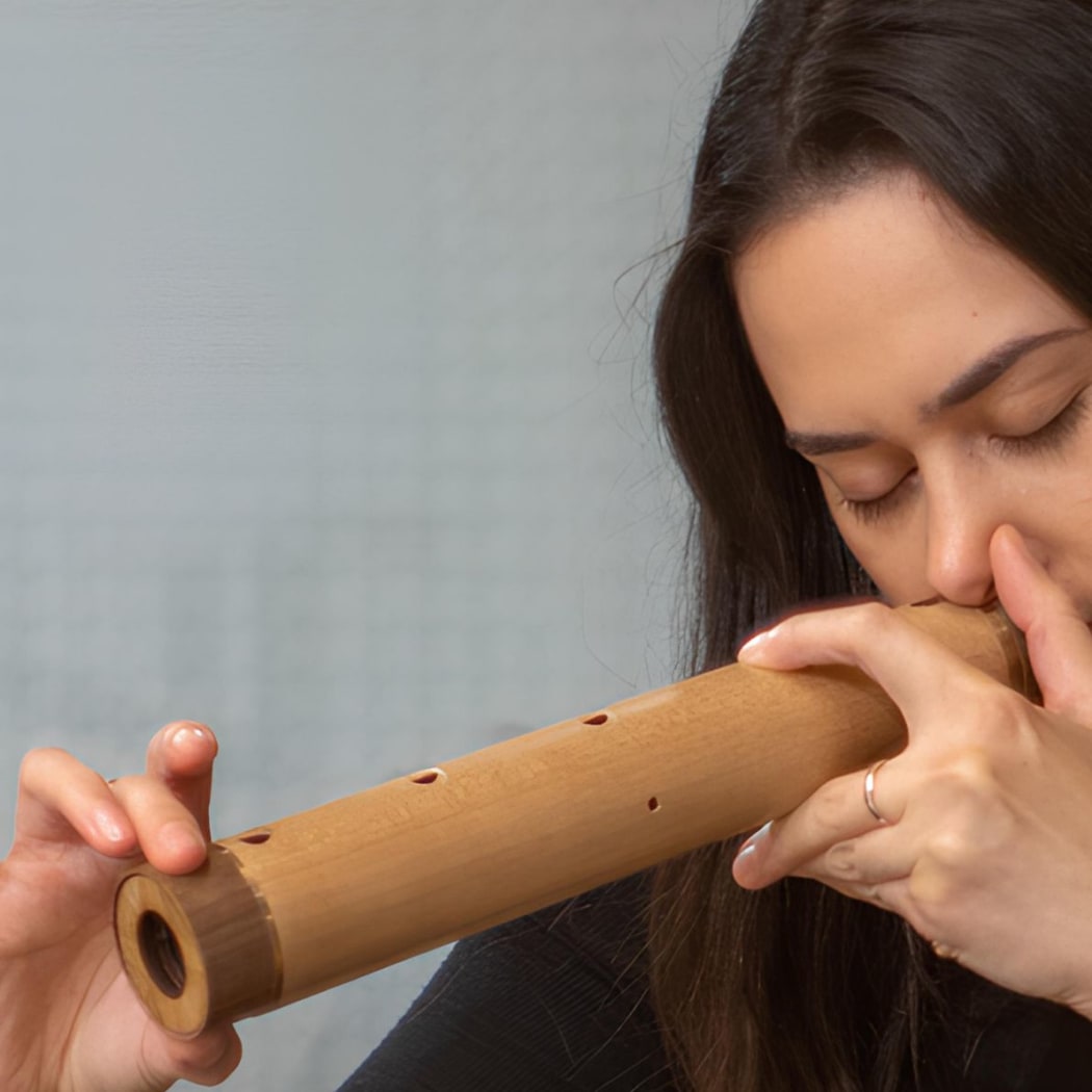 Dr Rachael Hall playing fangufangu.