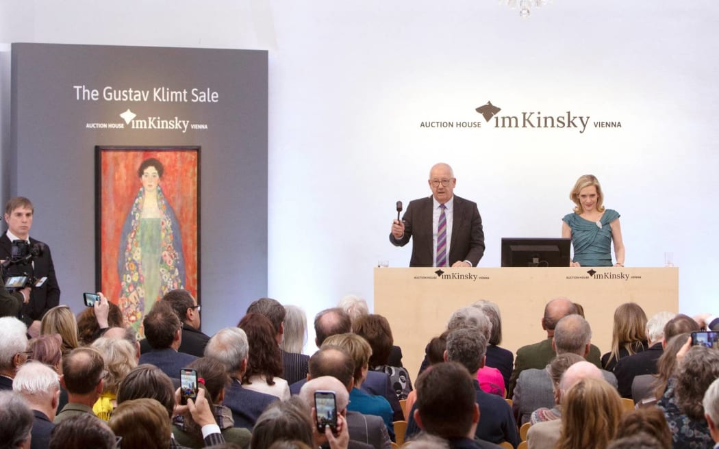 Auctioneer Michael Kovacek sells the Gustav Klimt painting 'Portrait of Miss Lieser' for €30,000,000 during the auction in Vienna on 24 April, 2024.