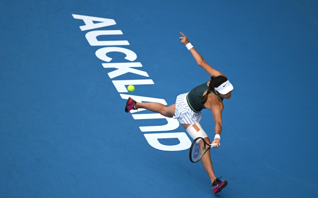 Emma Raducanu of Great Britain plays a backhand in her match against Elina Svitolina of Ukraine.