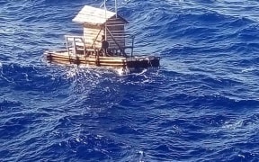 The teenager survived by cooking fish on wood his burnt from his vessel.