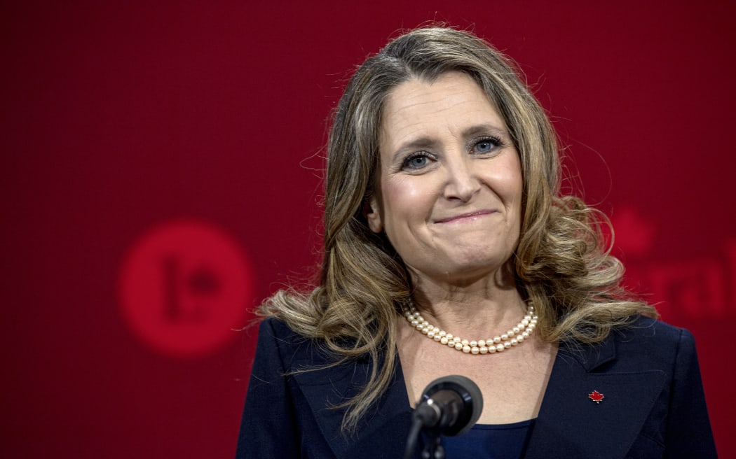 Chrystia Freeland, former finance minister and deputy prime minister of Canada, speaks during a press conference following the second night of debate in the federal Liberal leadership race to replace Canadian Prime Minister Justin Trudeau at the MELS studios in Montreal, Canada, on February 25, 2025. (Photo by ANDREJ IVANOV / AFP)