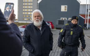 Anti-whaling activist Paul Watson arrives for a court hearing in Nuuk, Greenland, on October 2, 2024. - A Greenland court on Wednesday extended the detention of  Watson for three more weeks, pending a decision on his extradition to Japan, where he is wanted over a clash with whalers. For the third time since the 73-year-old US-Canadian campaigner's arrest in late July in Nuuk, the capital of the Danish autonomous territory, prosecutors had asked that Watson's detention be extended, as the legal review of Japan's extradition request drags on.