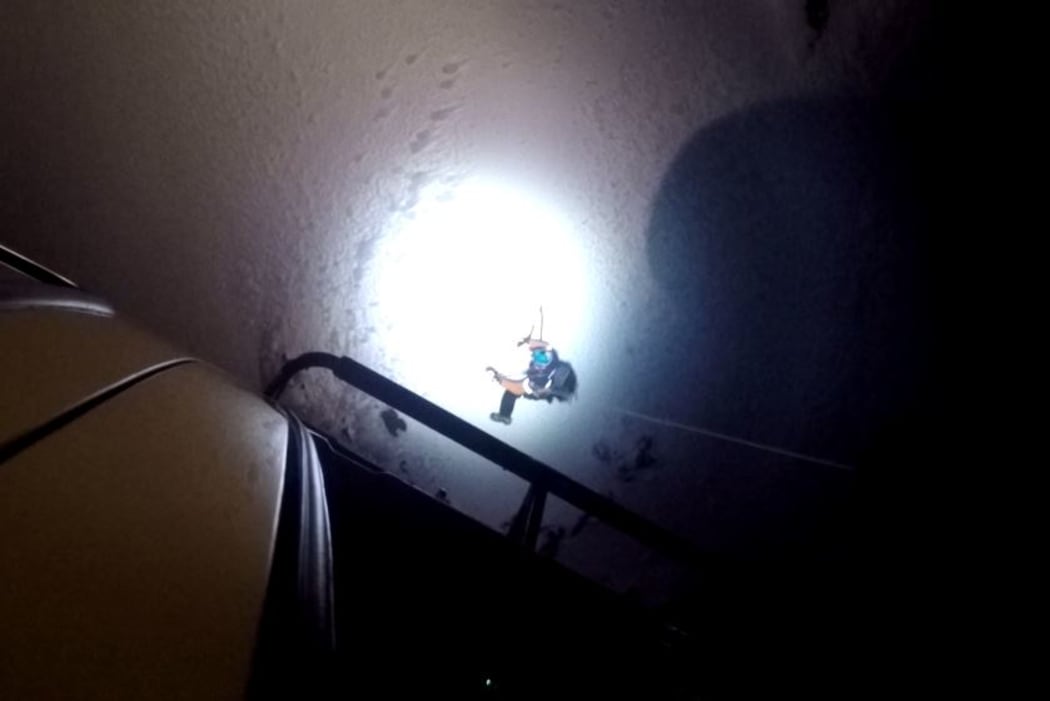 The night rescue on Mt Taranaki was challenged by falling ice.