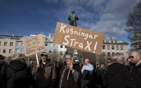 Protesters outside Iceland's parliament, Alltinget, in Reykjavik on Monday April 4, 2016.