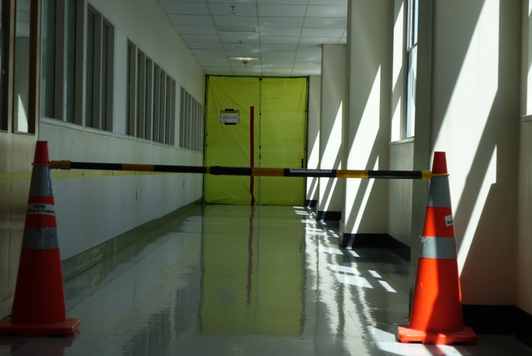 door blocked off due to asbestos