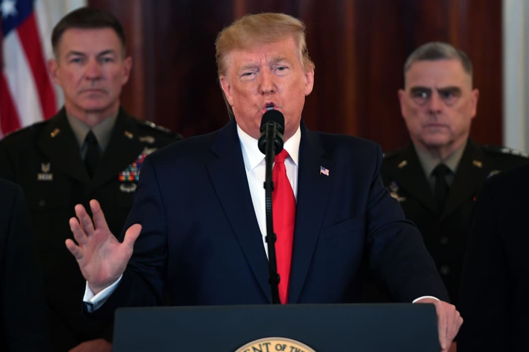 US President Donald Trump speaks about the situation with Iran in the Grand Foyer of the White House.