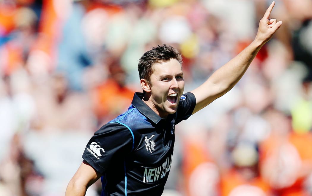 Trent Boult celebrates the wicket of Michael Clarke.