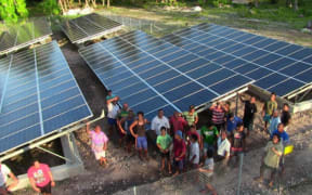 Solar panels like these on the tiny island of Nassau are proving to have major health and lifestyle benefits for outer islanders.