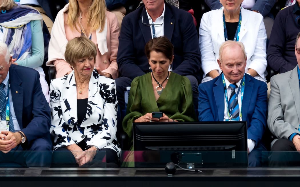 Margaret Court (centre-left) and Rod Laver (centre-right) are seen in the stands during round four of the Australian Open Tennis on January 27, 2020.