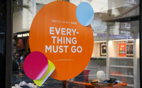 Smith & Caughey's - closing down sale sign