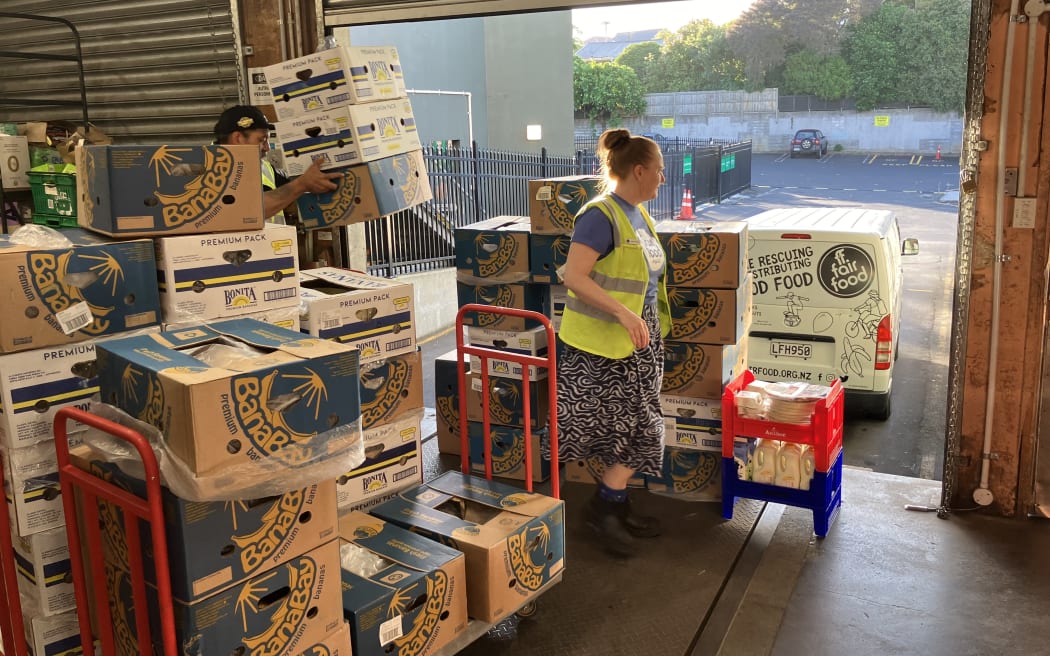Michelle Blau and Sonny Wade from Fair Food packing up a haul to take back to the hub.