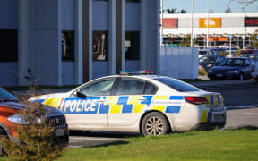 Police vehicle outside the Sudima Hotel, which is being used as a managed isolation facility in Christchurch.