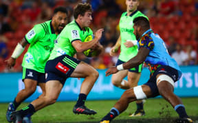 Joshua McKay of the Highlanders runs at Jed Holloway of the Waratahs during the Global Tens Tournament