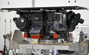 A view of the NASA IMAP (Interstellar Mapping and Acceleration Probe) spacecraft at the Astrotech Space Operations facility in Titusville, Florida, on August 28, 2025. NASA’s IMAP is designed to explore and map the boundaries of the heliosphere — a large bubble created by the Sun’s wind that encapsulates our entire solar system — and study how the heliosphere interacts with the local galactic neighborhood beyond. (Photo by Miguel J. Rodriguez Carrillo / AFP)